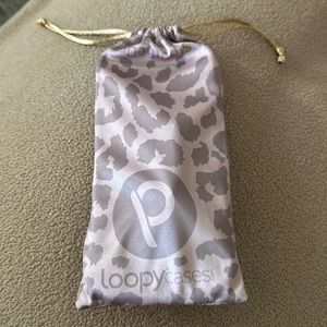 Excellent condition Loopy case for phone 14 pro max.  Righty.  Gold leopard.